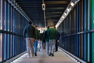 Group of prisoners on a walkway in Low Moss