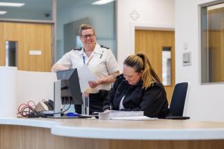 Staff at reception desk in Stirling