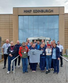 Staff group photo outside HMP Edinburgh